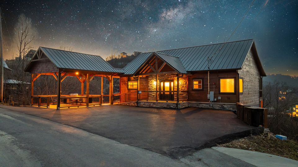 Front of the chalet and covered pavilion at night