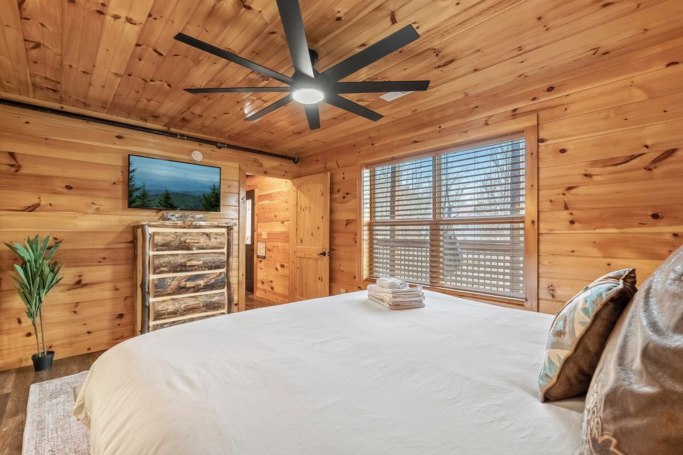 King bedroom with plush bedding